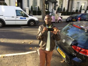 SPY IN BLACK LEATHER JACKET AND DROWN TROUSER AT THE DEMONSTRATION AT HOLLAND PARK LONDON