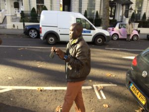 SPY IN BLACK LEATHER JACKET AND DROWN TROUSER AT THE DEMONSTRATION AT HOLLAND PARK LONDON